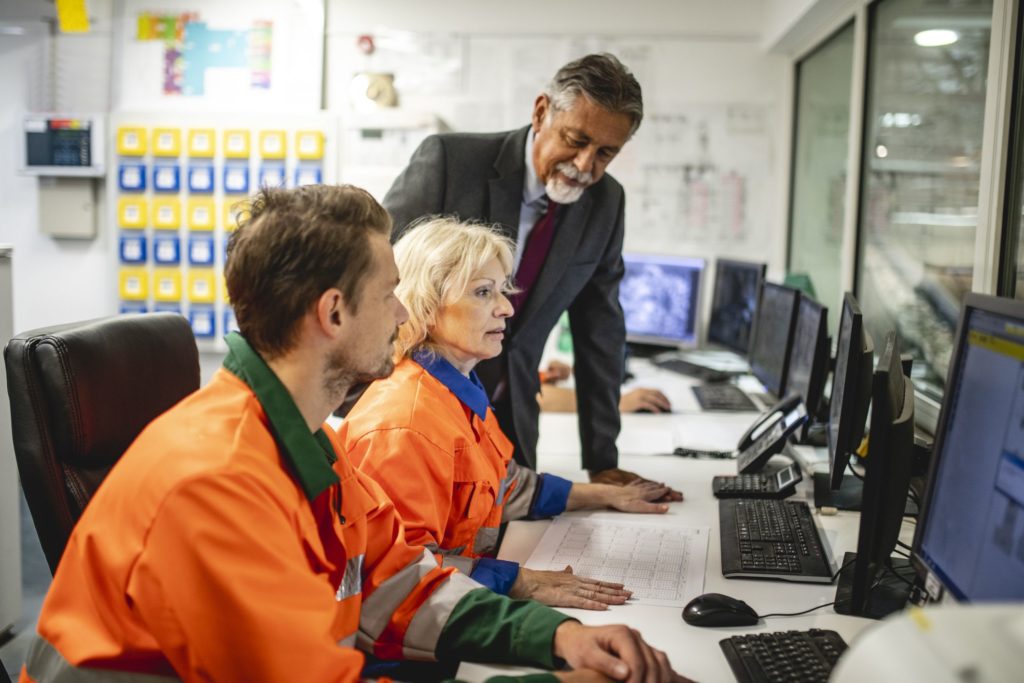 control room operators at desk